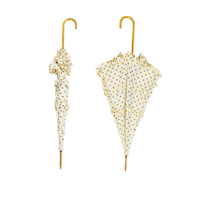 Paraguas de las señoras del diseño de la moda con el marco de oro del cordón